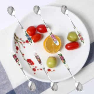 Set van 6 decoratieve rvs theelepels met porseleinen handvatten