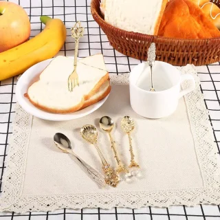 Set van 6 vintage gouden koffielepels en vork
