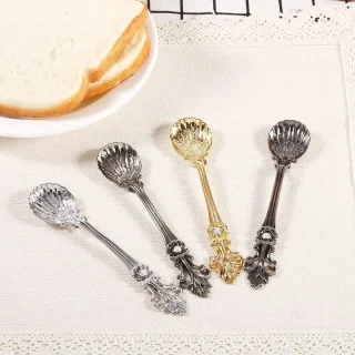 Set van 6 vintage gouden koffielepels en vork