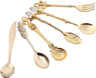 Set van 6 vintage gouden koffielepels en vork