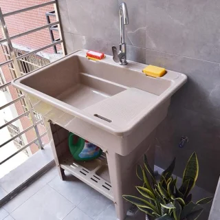 Vrijstaande buitenkeuken met spoelbak