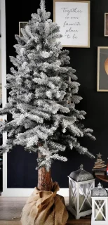 Kunstkerstboom 180cm op houten stam besneeuwd