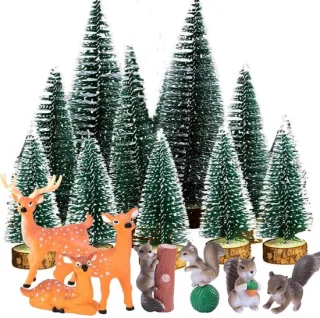 Mini kunstkerstboomset met figuren en sneeuw