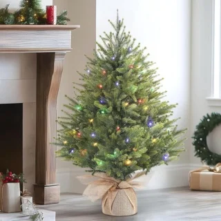 Mini kunstmatige kerstboom 2ft met led-verlichting en jute zakbasis