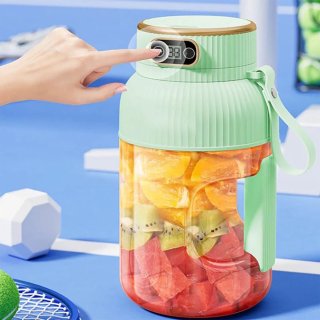 De Draagbare elektrische fruitpers, blender, sapcentrifuge, shaker, smoothiemaker - groen in één oogopslag