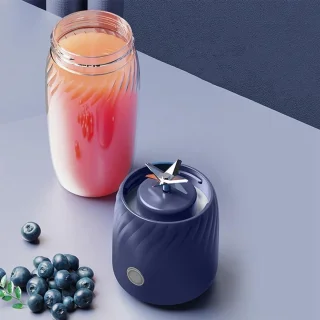 Mini draagbare sapcentrifuge - blauw