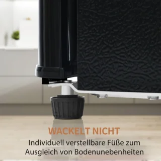 Retro koelkast. Koel-vriescombinatie, 105,5 cm hoog, 41 cm breed, twee deuren, met een totaal volume van 92 liter, vriesvolume van 28 liter. Deurvakken en glazen planken. 116 kWh/jaar, -27 °C ~13 °C, ledverlichting, zwart