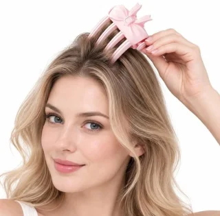 Haarstyler met verwarmde haarclip