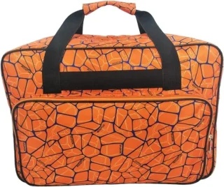 Naaimachine draagtas oranje