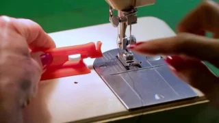 Naaldinrijger voor naaimachine