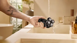 Philips Series 7000 Headshaver - Scheerapparaat mannen hoofd - Wet&Dry - Flexibele scheerkop - Opbergetui - Reinigingsstation- HS7980/15